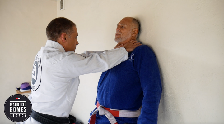 Defence Against a Two Handed Strangle with Back to the Wall