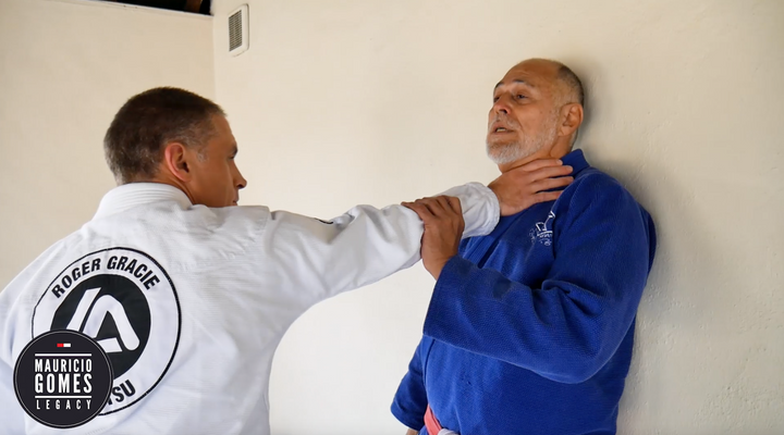 Defence Against a One Handed Strangle with Back to the Wall