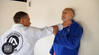 Defence Against a One Handed Strangle with Back to the Wall